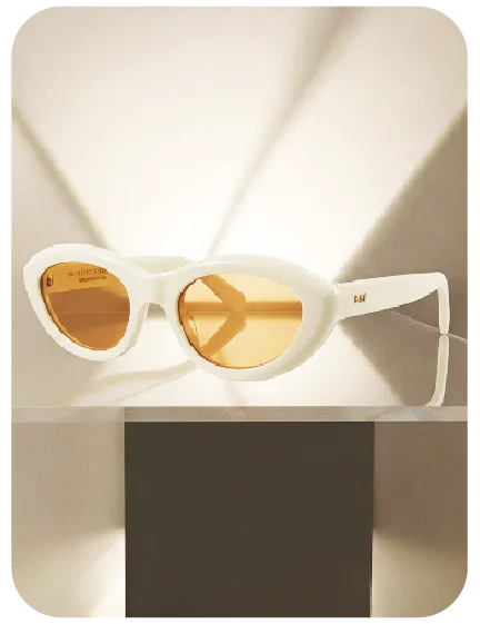 RSF de sol cat-eye de acetato blanco hueso con lente ámbar